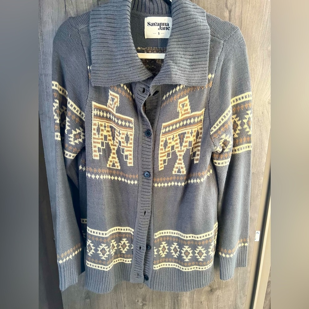 Great condition cardigan. Thunder bird on front and back.